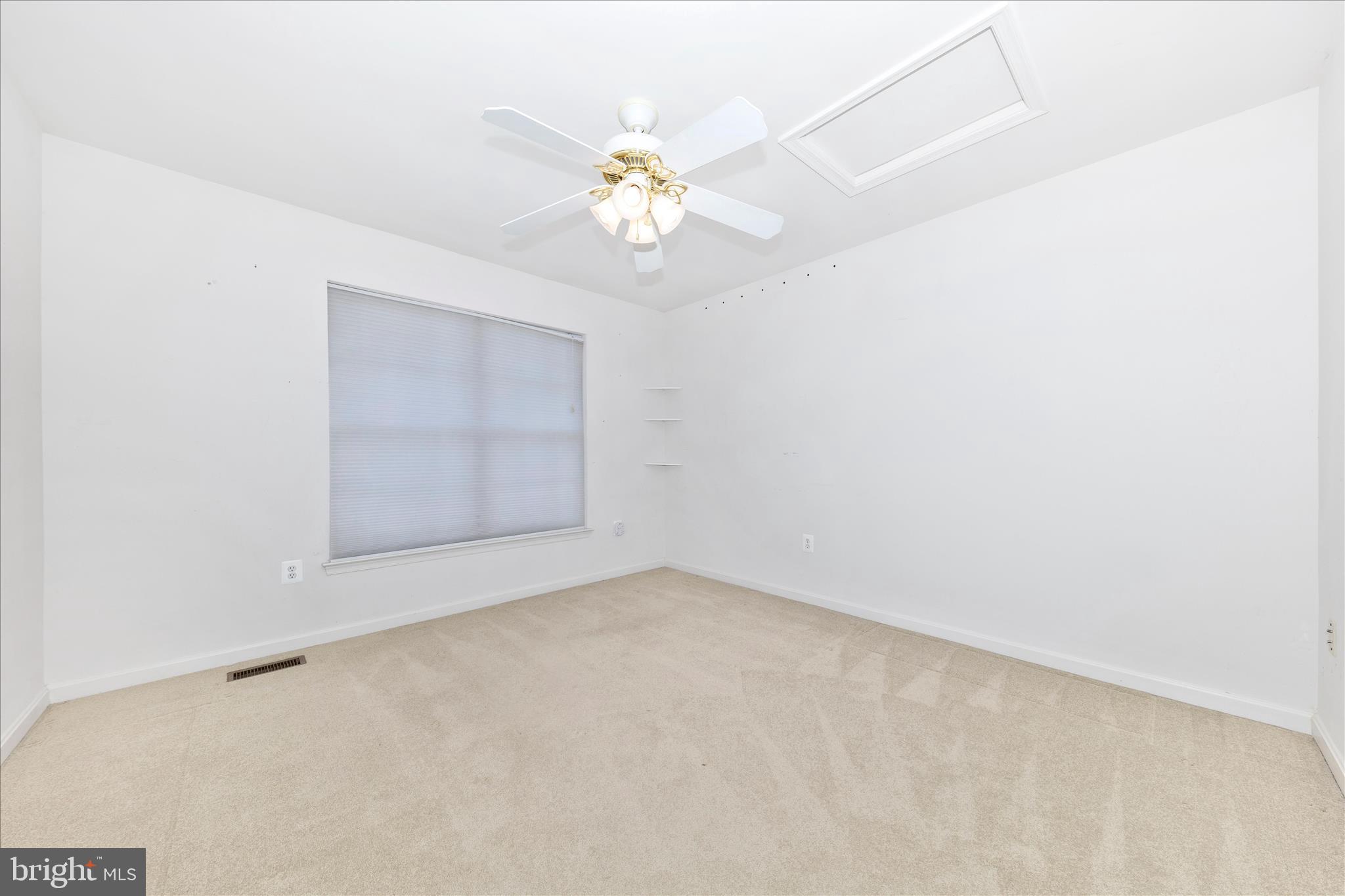 100 Sunlight Drive Frederick, MD 21702 - Photo 16 of 41 an empty room with a window and a chandelier fan