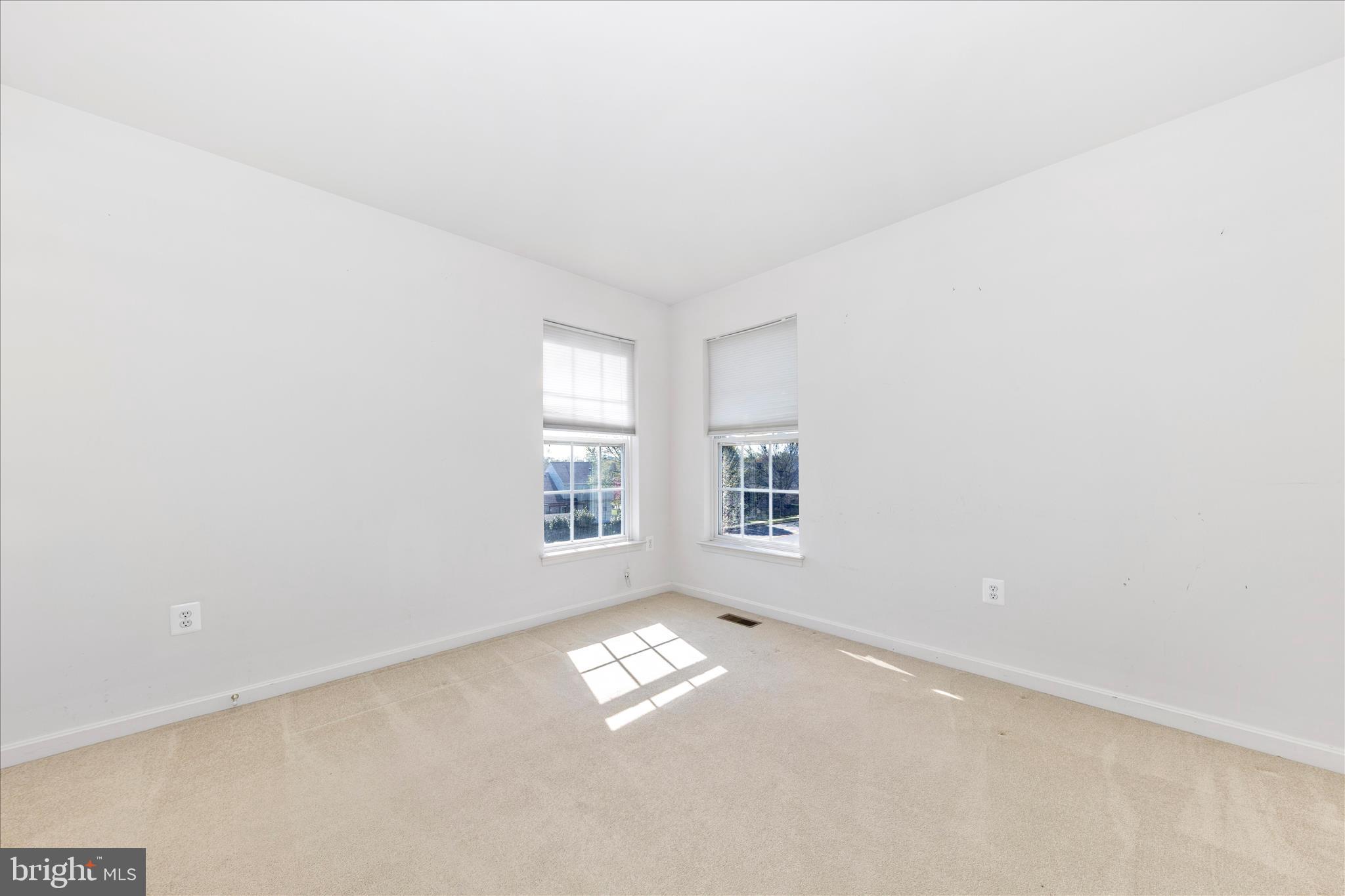100 Sunlight Drive Frederick, MD 21702 - Photo 17 of 41 an empty room with windows