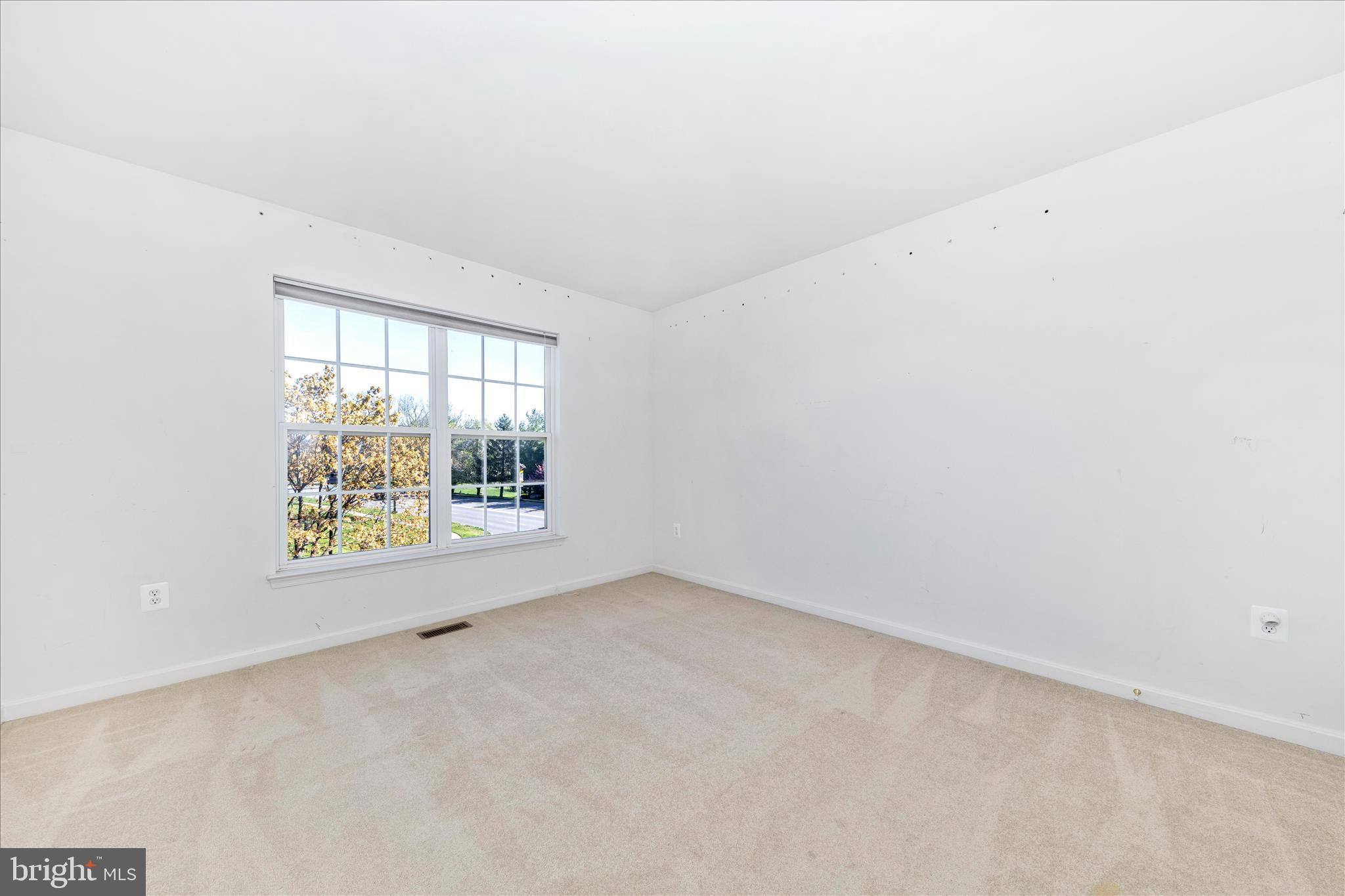 100 Sunlight Drive Frederick, MD 21702 - Photo 18 of 41 an empty room with windows