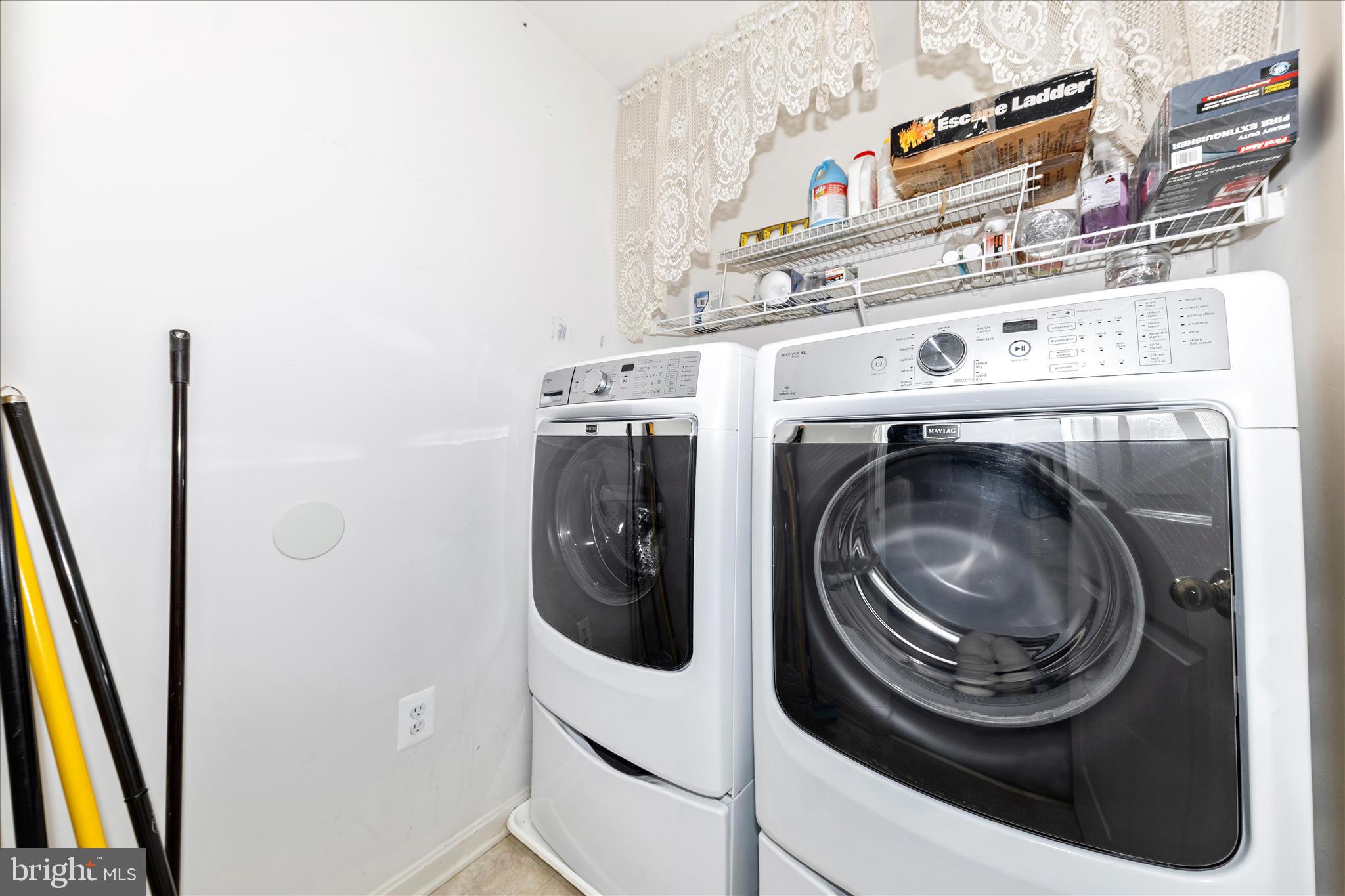 100 Sunlight Drive Frederick, MD 21702 - Photo 19 of 41 a close up view of a washer and dryer