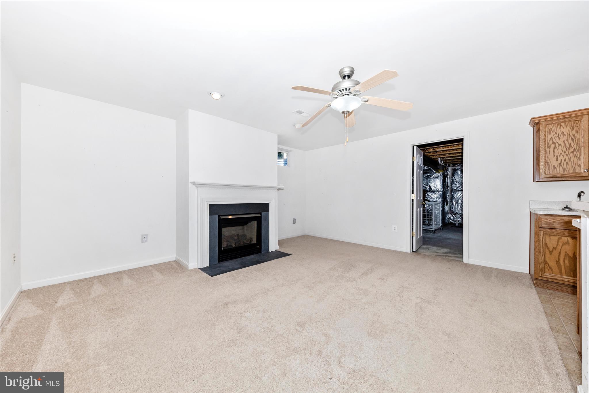 100 Sunlight Drive Frederick, MD 21702 - Photo 25 of 41 a view of empty room with a fireplace