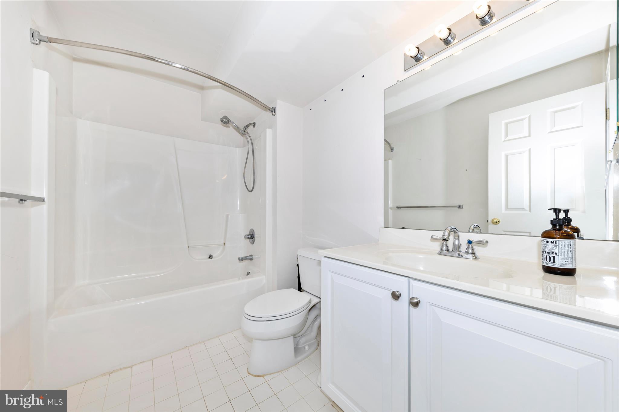 100 Sunlight Drive Frederick, MD 21702 - Photo 29 of 41 a bathroom with a sink a toilet and shower