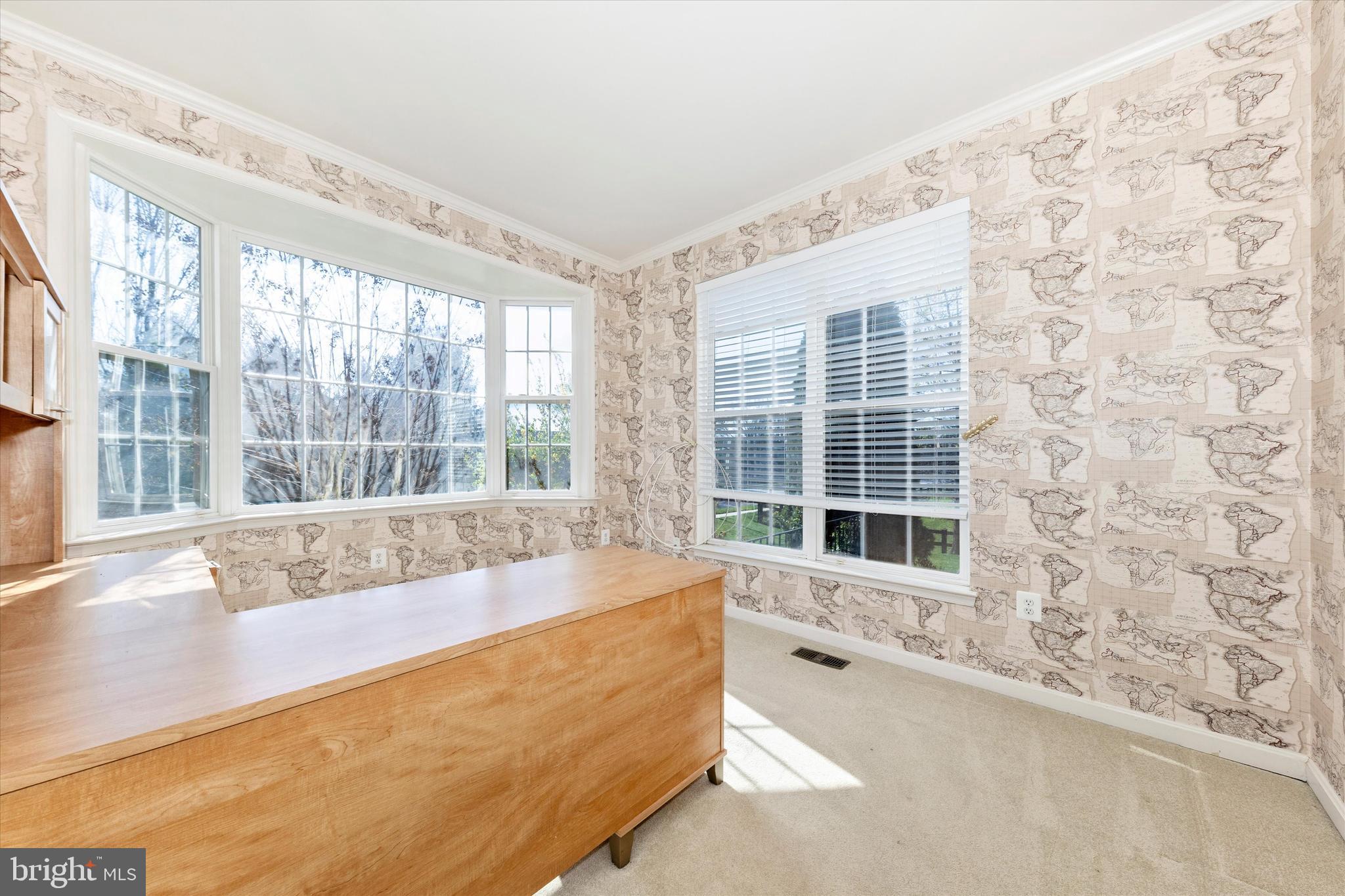 100 Sunlight Drive Frederick, MD 21702 - Photo 5 of 41 a bath tub sitting in front of a window