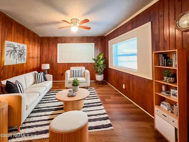 a kitchen with stainless steel appliances granite countertop a stove a microwave and oven