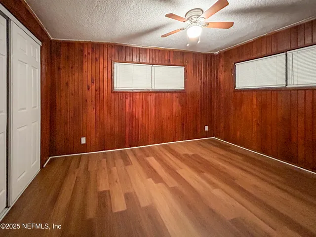 a view of a lake with a big yard