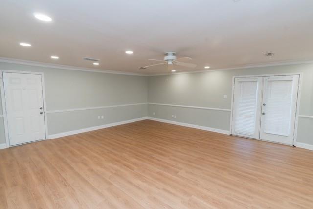 106 Mapleleaf Lane Coppell, TX 75019 - Photo 12 of 36 Spacious room featuring wood-finish flooring, recessed lighting, a ceiling fan, and French doors with integrated blinds