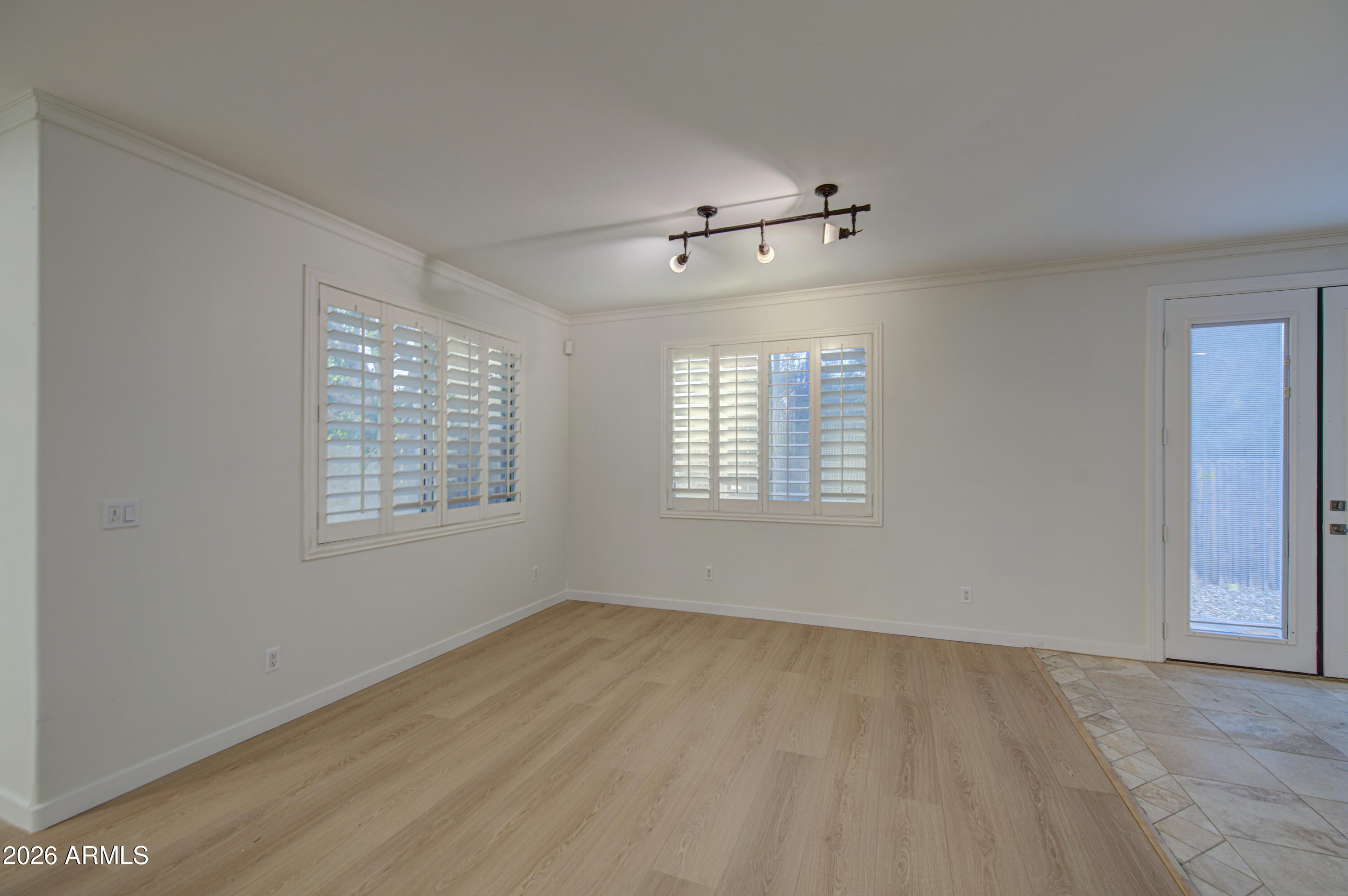 6018 North 5th Place Phoenix, AZ 85014 - Photo 9 of 53 a view of an empty room with a window