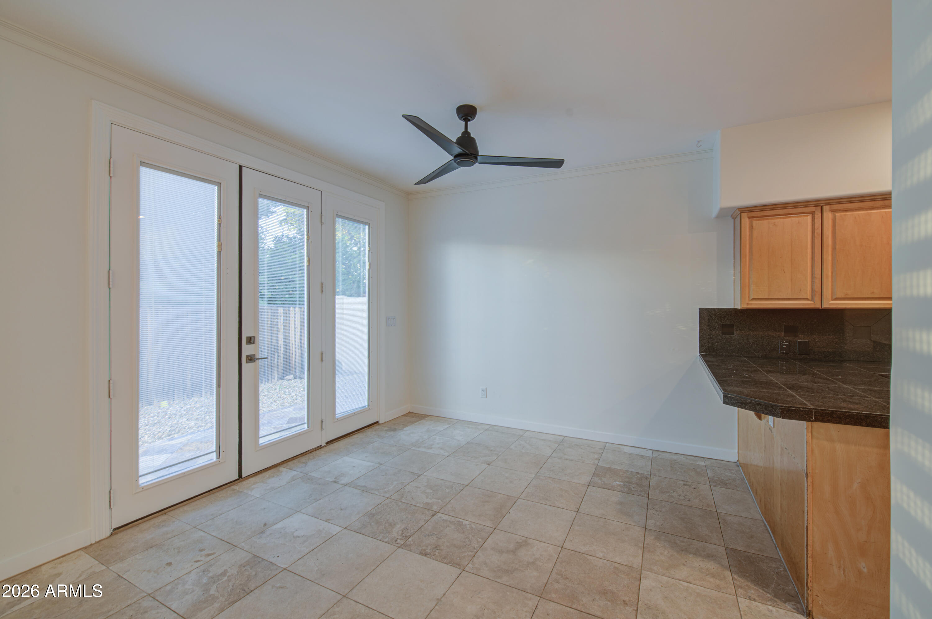 6018 North 5th Place Phoenix, AZ 85014 - Photo 14 of 53 wooden floor in an empty room with a window