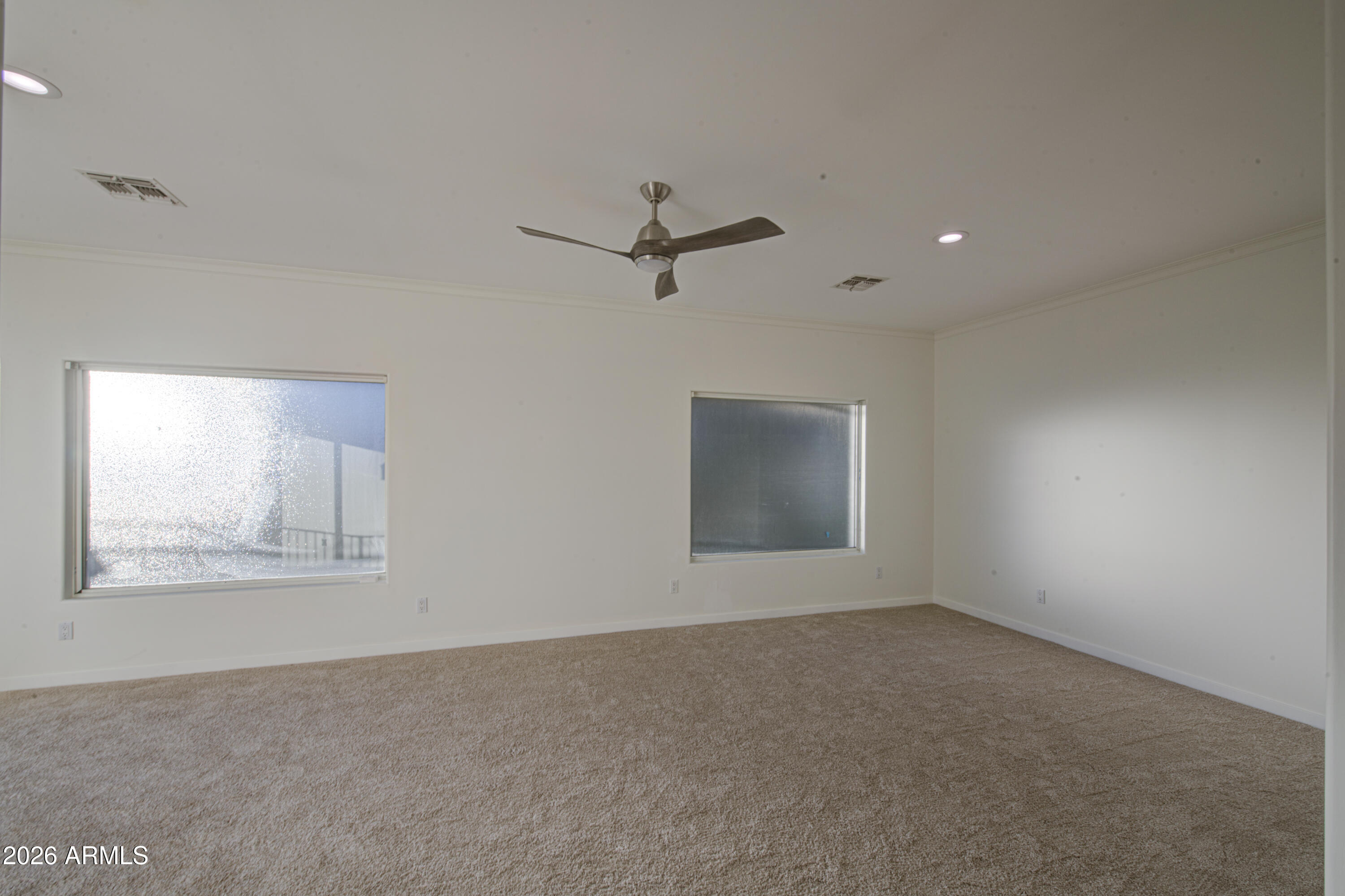 6018 North 5th Place Phoenix, AZ 85014 - Photo 21 of 53 a view of a livingroom with a ceiling fan and window