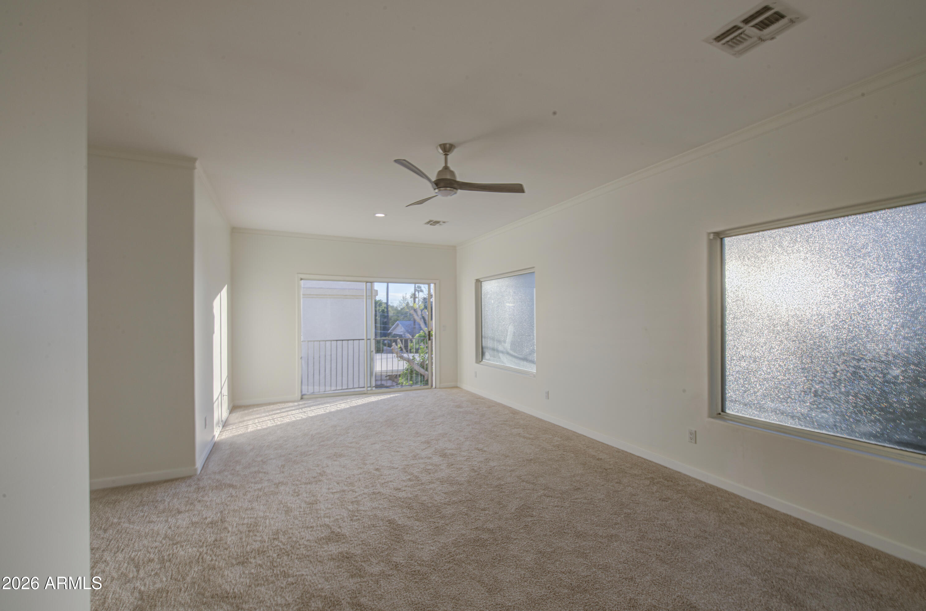 6018 North 5th Place Phoenix, AZ 85014 - Photo 22 of 53 a view of a livingroom with a ceiling fan and window