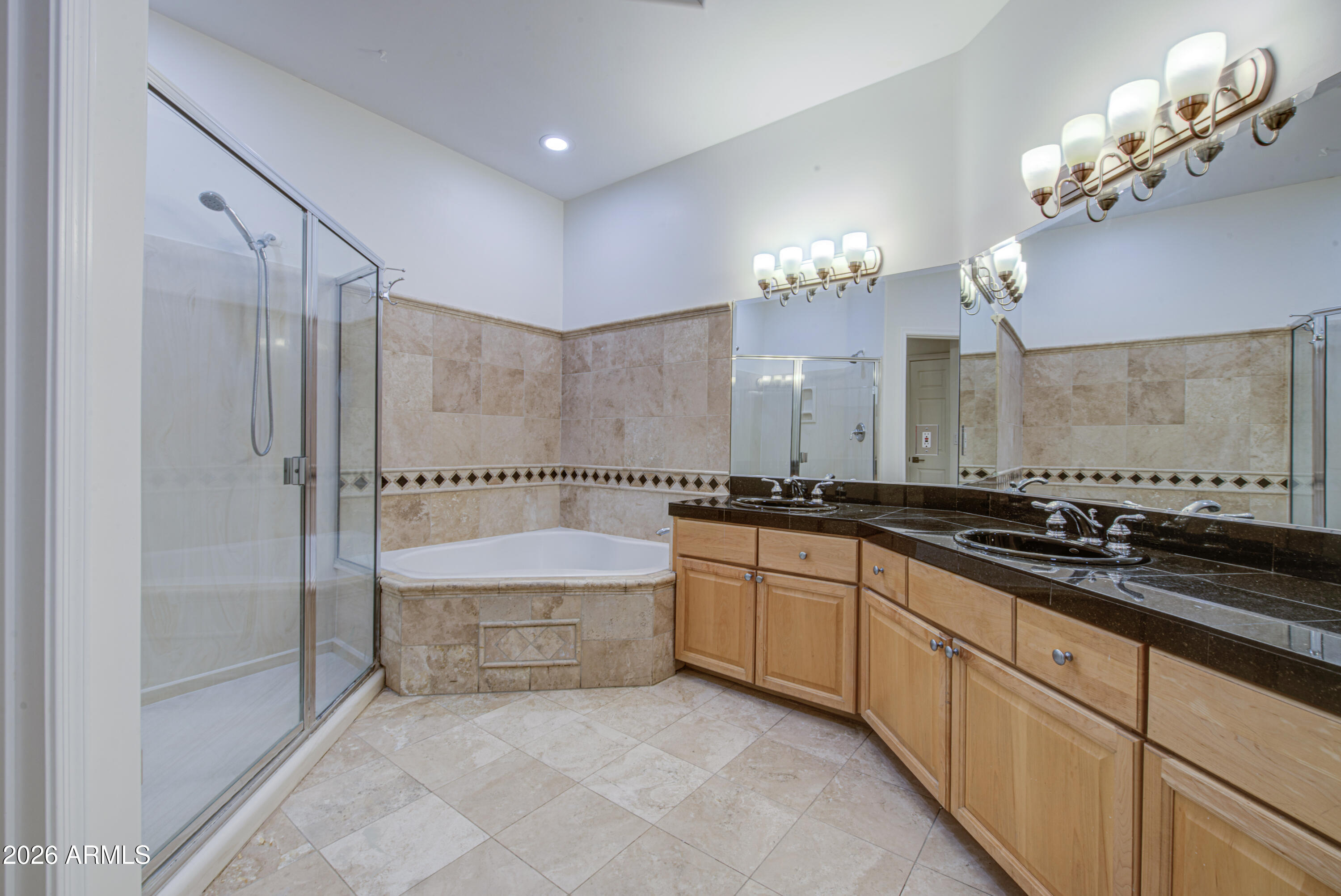 6018 North 5th Place Phoenix, AZ 85014 - Photo 27 of 53 a large bathroom with a sink and a large mirror