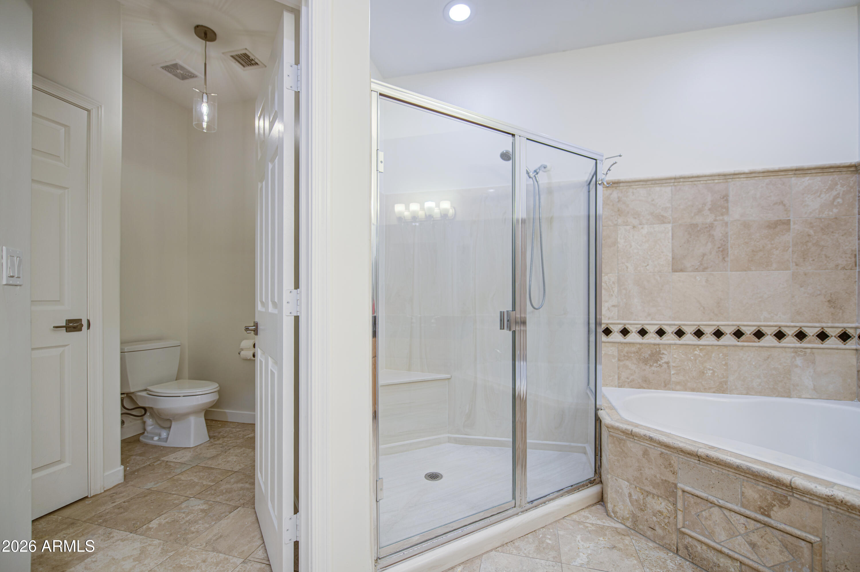 6018 North 5th Place Phoenix, AZ 85014 - Photo 28 of 53 a bathroom with a shower a toilet and a shower