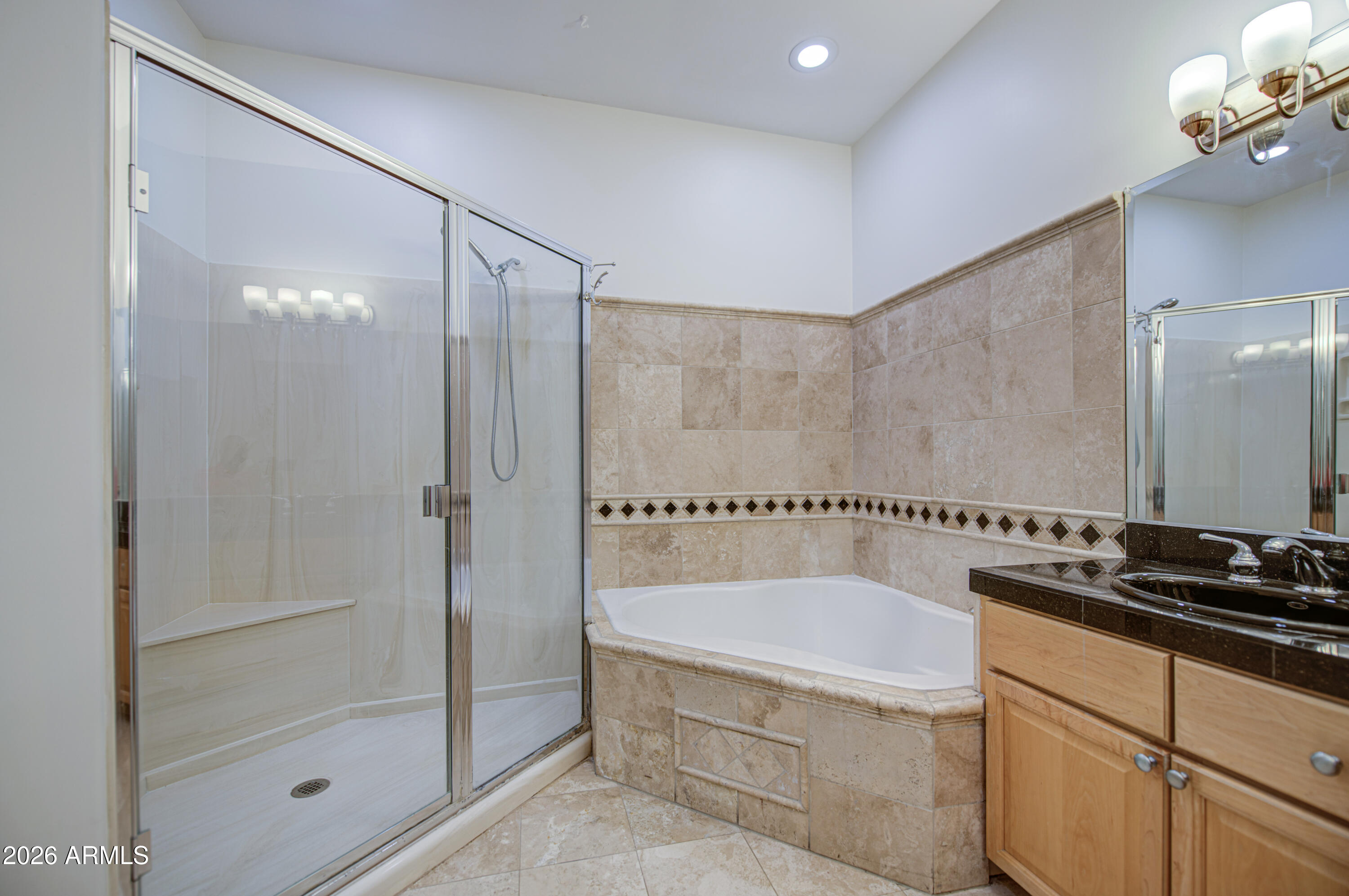 6018 North 5th Place Phoenix, AZ 85014 - Photo 29 of 53 a bathroom with a tub shower vanity and a sink