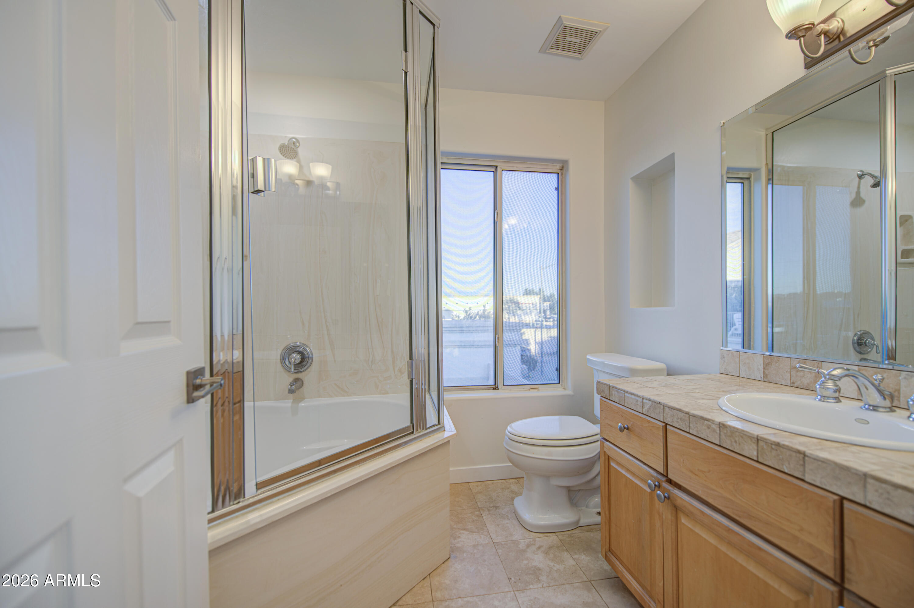 6018 North 5th Place Phoenix, AZ 85014 - Photo 34 of 53 a bathroom with a sink a toilet and shower