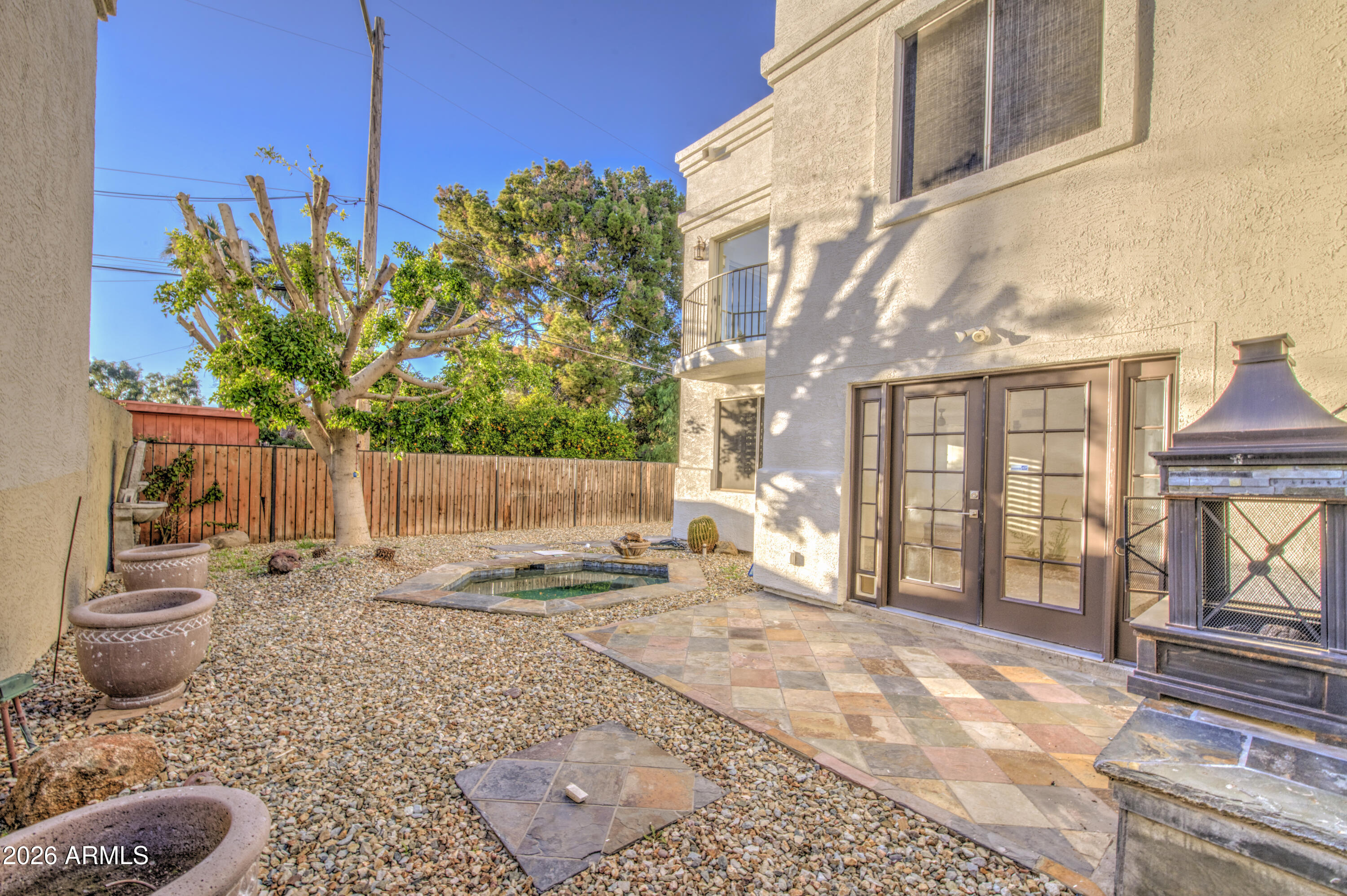 6018 North 5th Place Phoenix, AZ 85014 - Photo 50 of 53 a backyard of a house with outdoor seating
