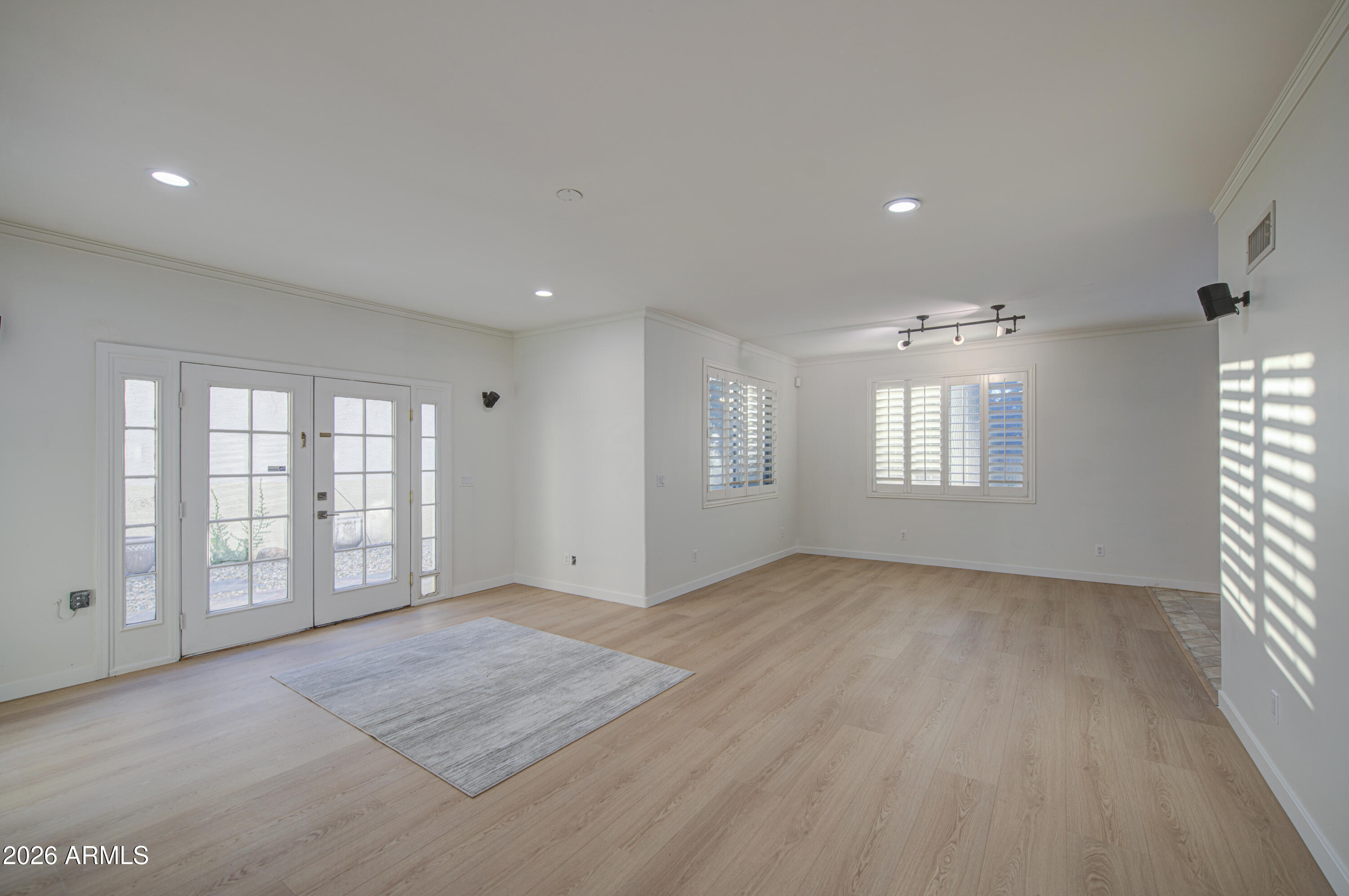 6018 North 5th Place Phoenix, AZ 85014 - Photo 5 of 53 a view of an empty room with a window