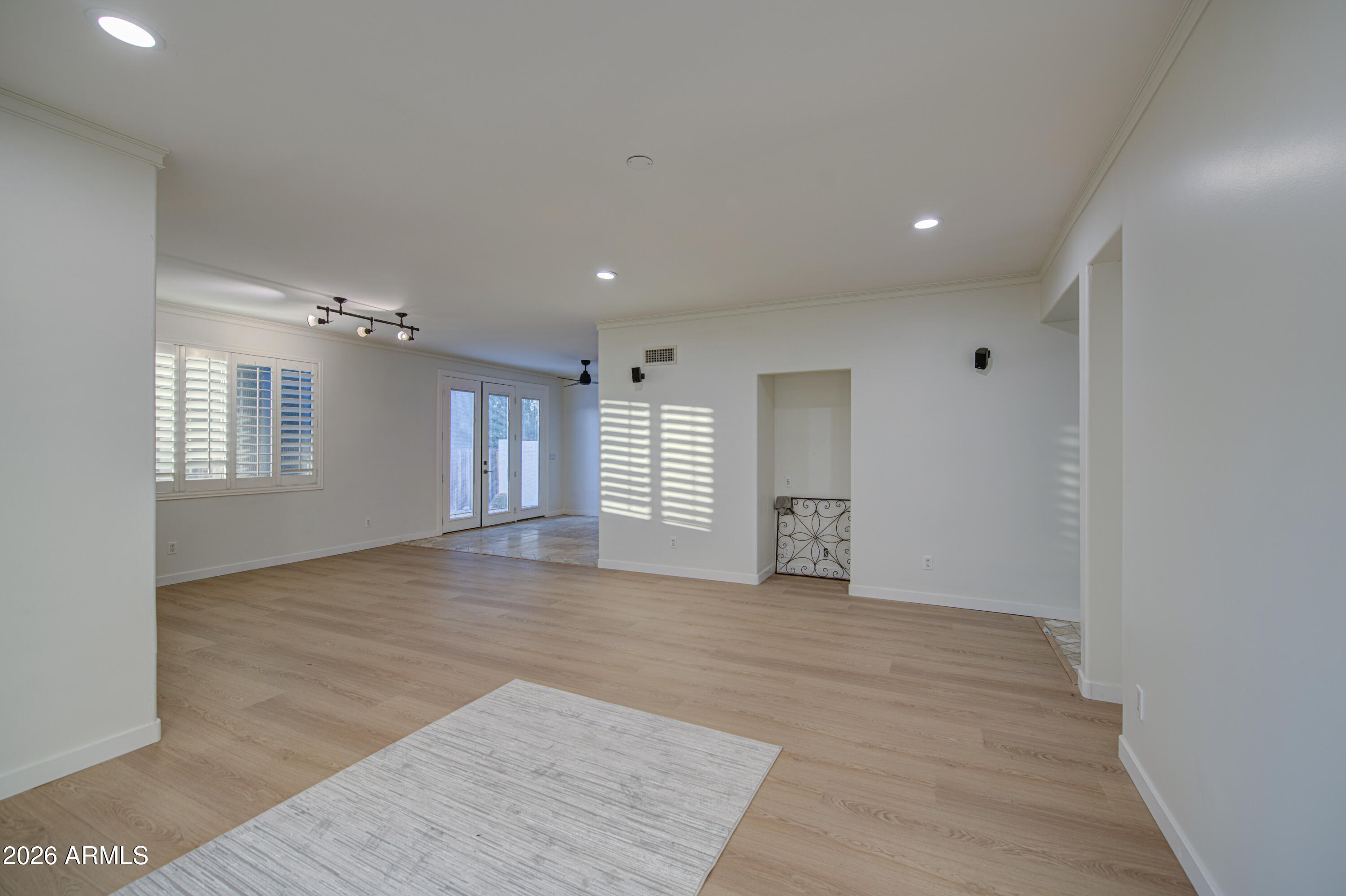 6018 North 5th Place Phoenix, AZ 85014 - Photo 6 of 53 a view of an empty room with a window