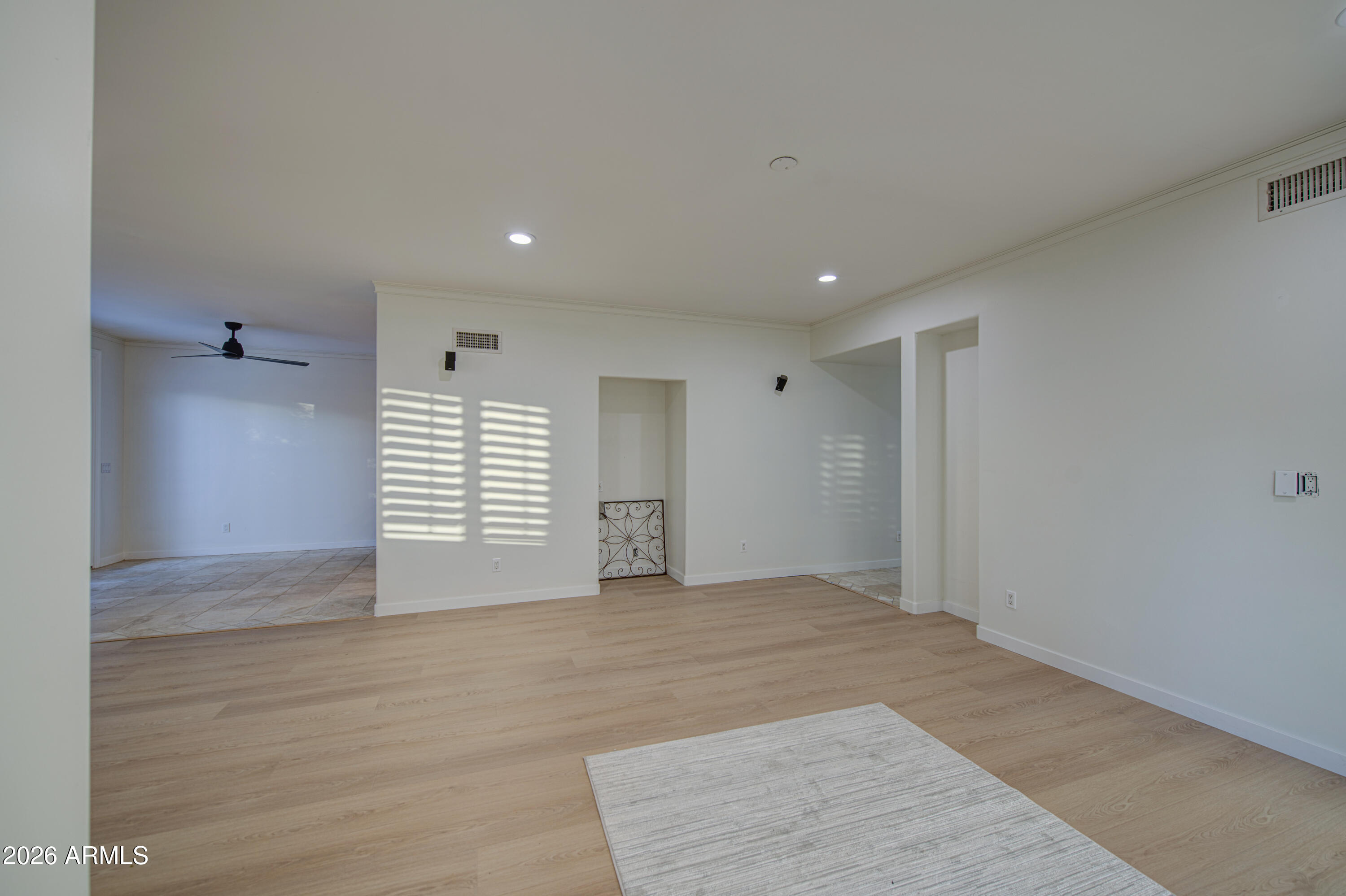 6018 North 5th Place Phoenix, AZ 85014 - Photo 7 of 53 a view of an empty room with a window