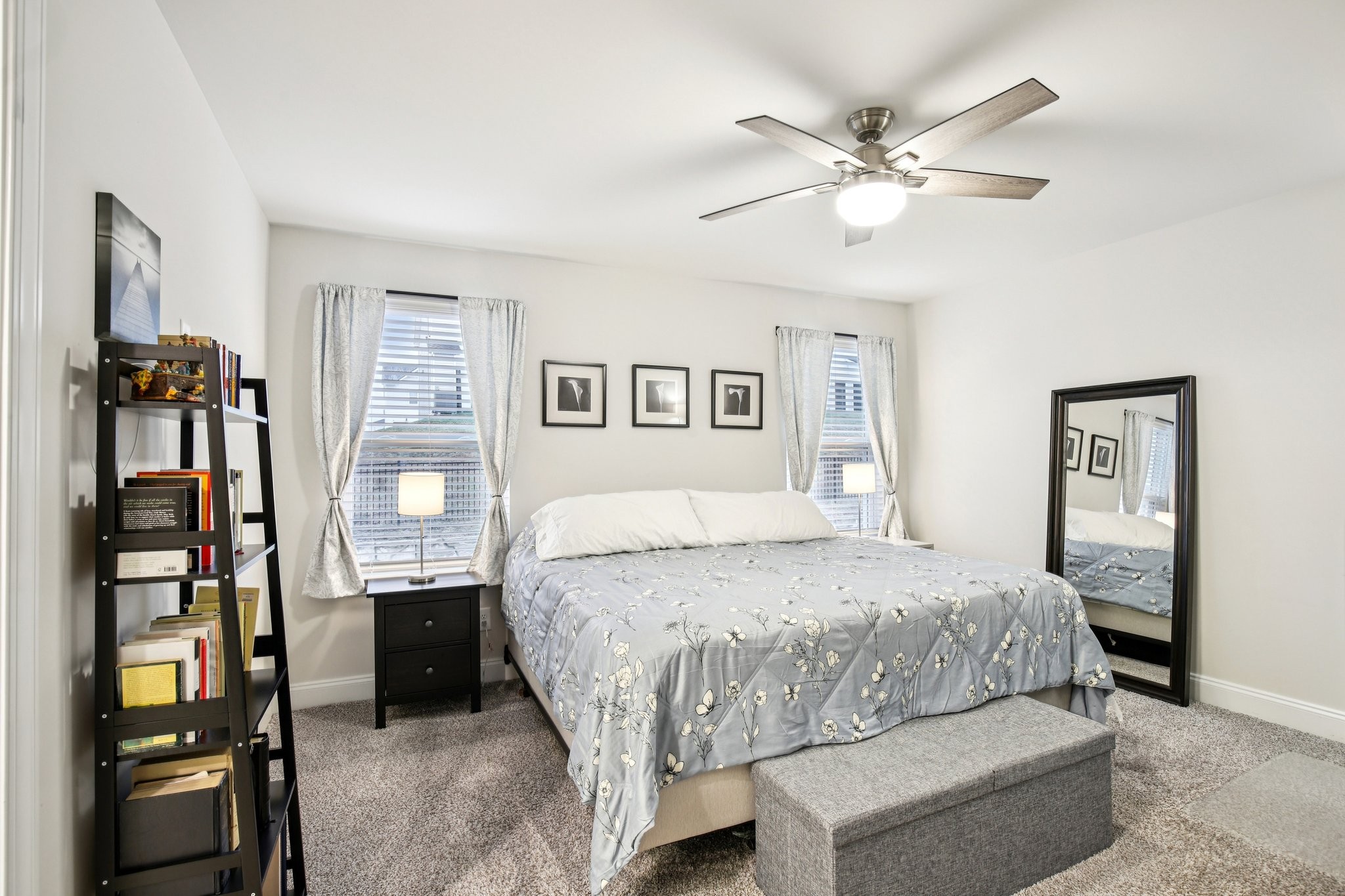 4657 Ridge Bend Drive Nashville, TN 37207 - Photo 13 of 21 a bedroom with a large bed and a chandelier