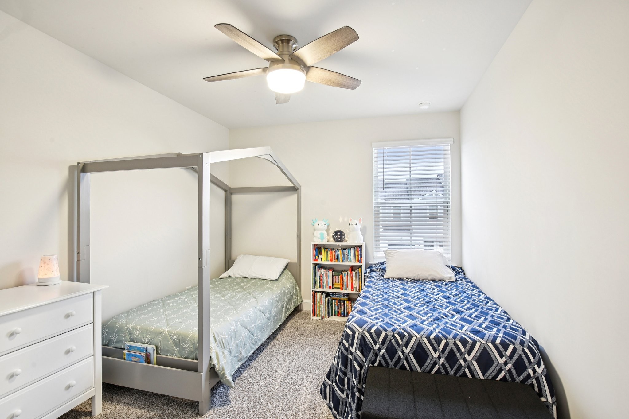 4657 Ridge Bend Drive Nashville, TN 37207 - Photo 17 of 21 a bedroom with a bed and a chandelier