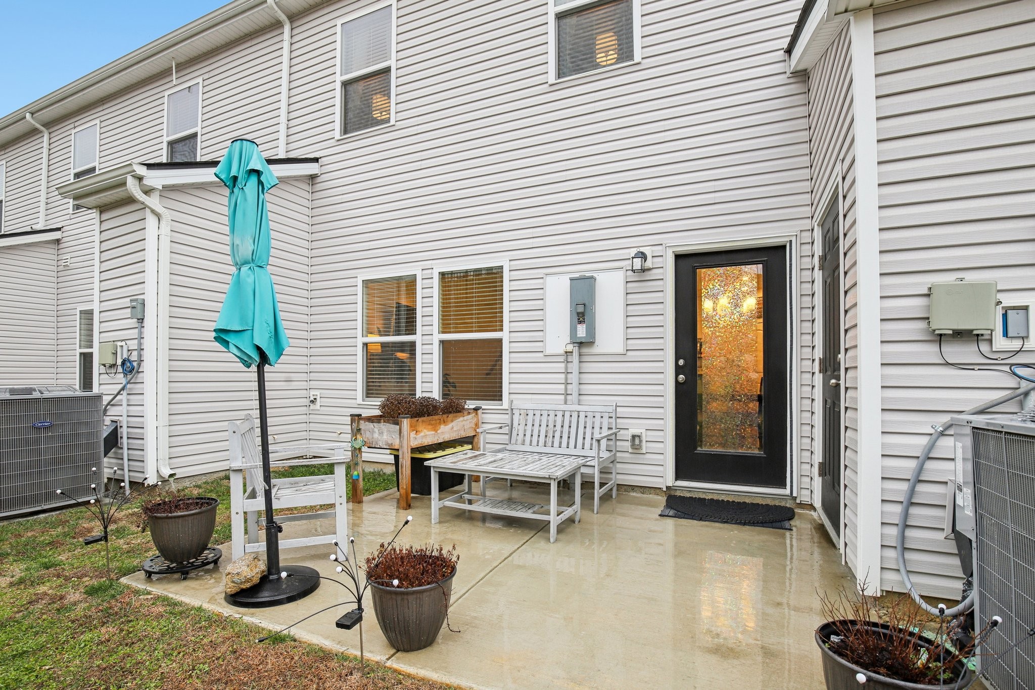 4657 Ridge Bend Drive Nashville, TN 37207 - Photo 20 of 21 a view of a patio with chairs and potted plants