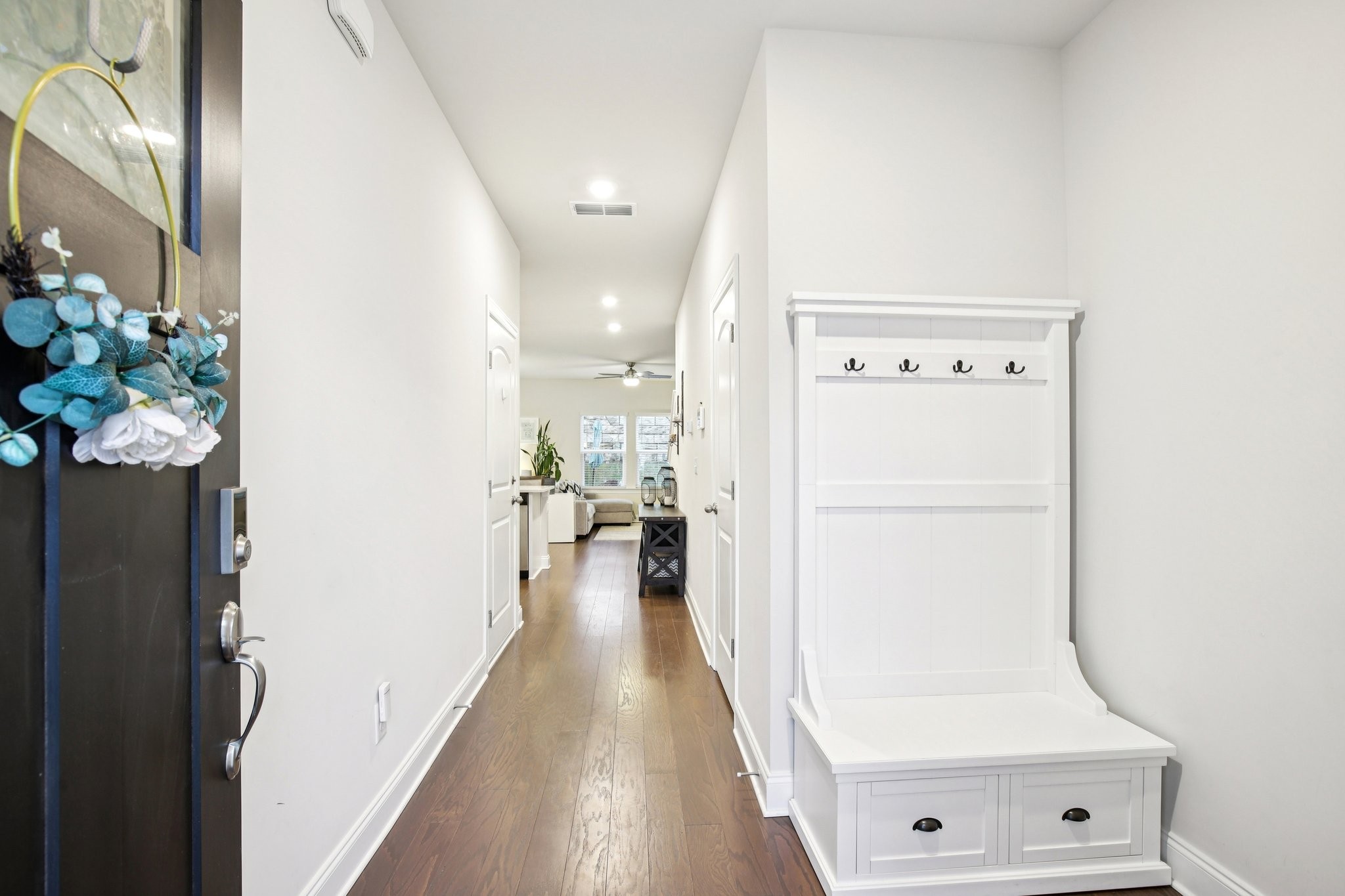 4657 Ridge Bend Drive Nashville, TN 37207 - Photo 3 of 21 a view of a hallway with wooden floor
