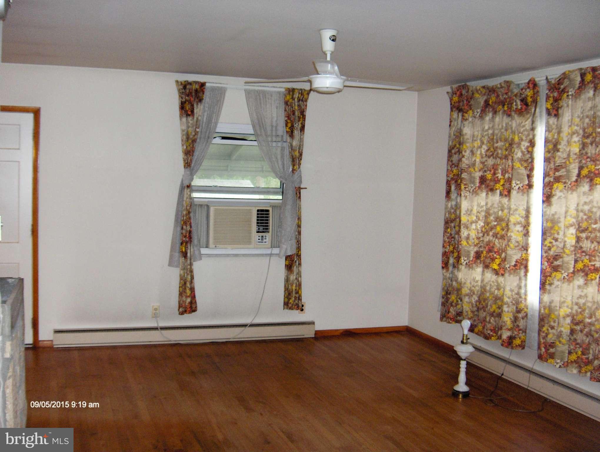 1716 Lynch Road Baltimore, MD 21222 - Photo 8 of 28 a view of entryway with wooden floor