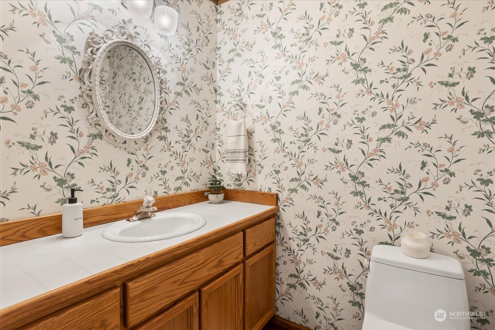 8418 192nd Street Southwest Edmonds, WA 98026 - Photo 19 of 39 a bathroom with a sink and a toilet