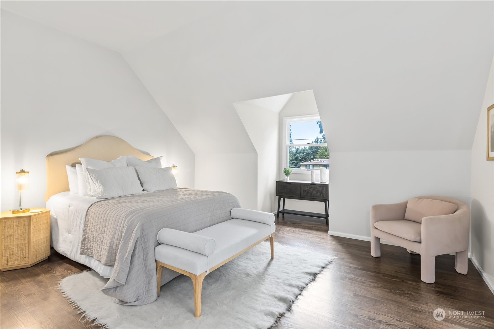 8418 192nd Street Southwest Edmonds, WA 98026 - Photo 20 of 39 a bedroom with a bed and a chair