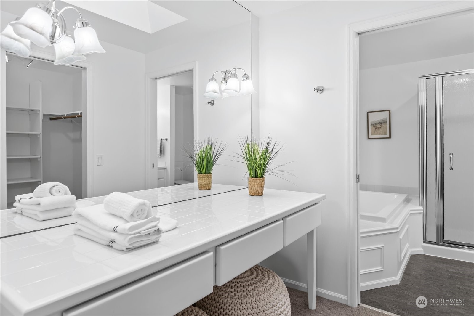 8418 192nd Street Southwest Edmonds, WA 98026 - Photo 21 of 39 a bath room with a sink and a mirror