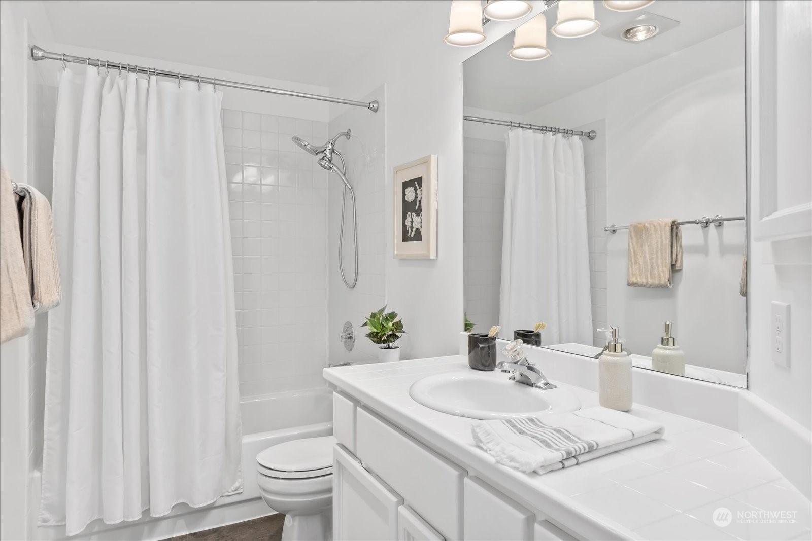 8418 192nd Street Southwest Edmonds, WA 98026 - Photo 25 of 39 a bathroom with a sink toilet and shower