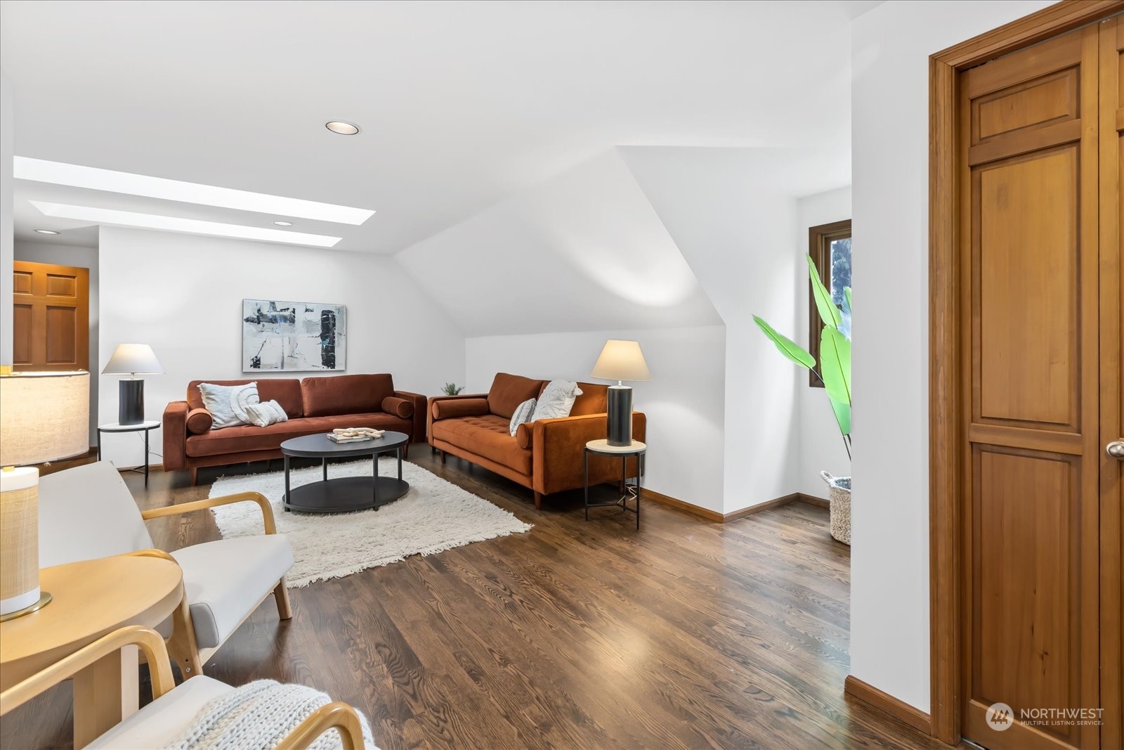 8418 192nd Street Southwest Edmonds, WA 98026 - Photo 27 of 39 a living room with furniture and a wooden floor