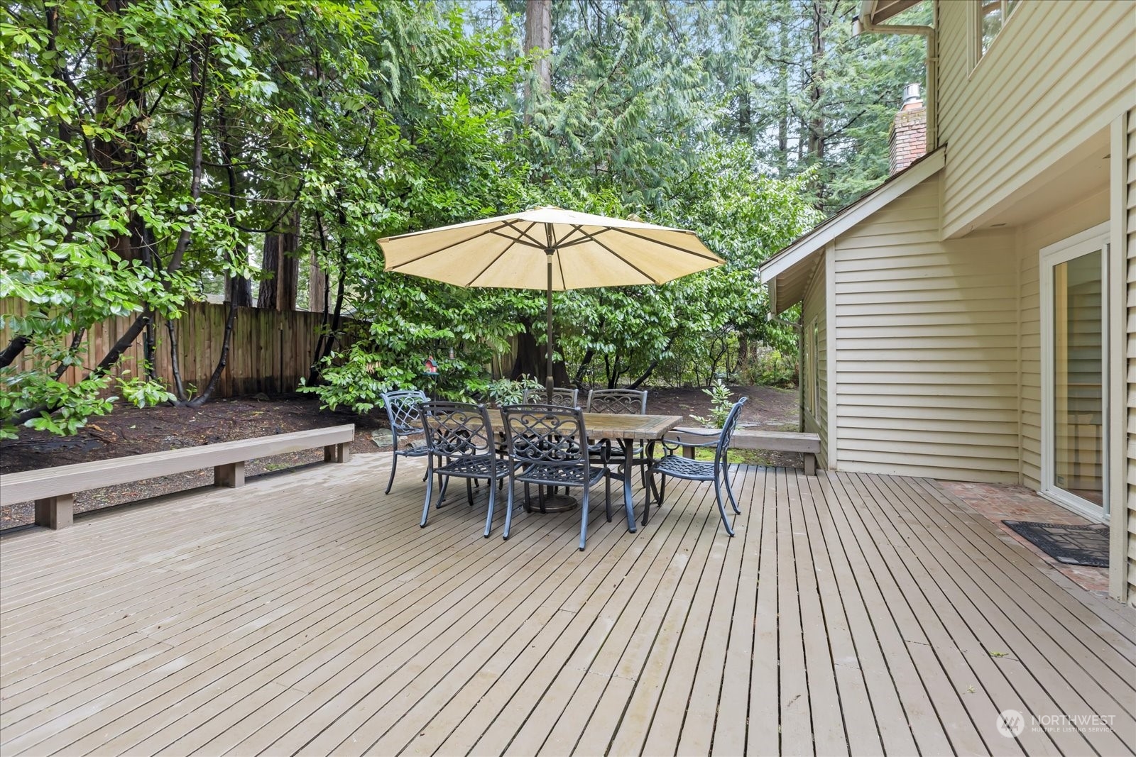 8418 192nd Street Southwest Edmonds, WA 98026 - Photo 30 of 39 an outdoor space with furniture and umbrella