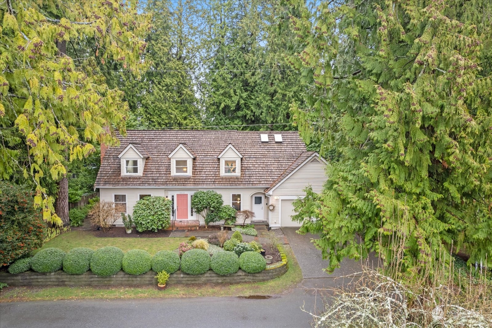 8418 192nd Street Southwest Edmonds, WA 98026 - Photo 36 of 39 a front view of a house with a yard
