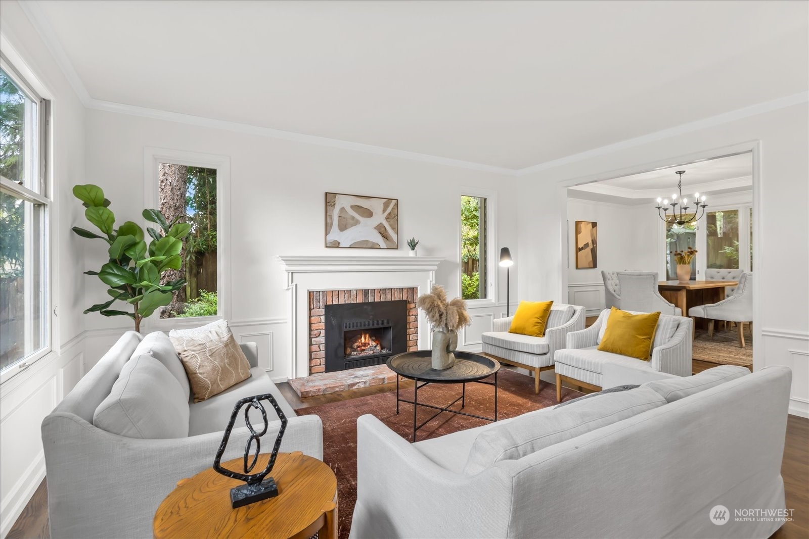 8418 192nd Street Southwest Edmonds, WA 98026 - Photo 4 of 39 a living room with furniture fireplace and a potted plant