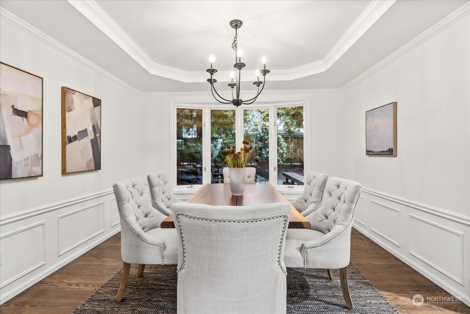 8418 192nd Street Southwest Edmonds, WA 98026 - Photo 7 of 39 a dining room with furniture a chandelier and a rug
