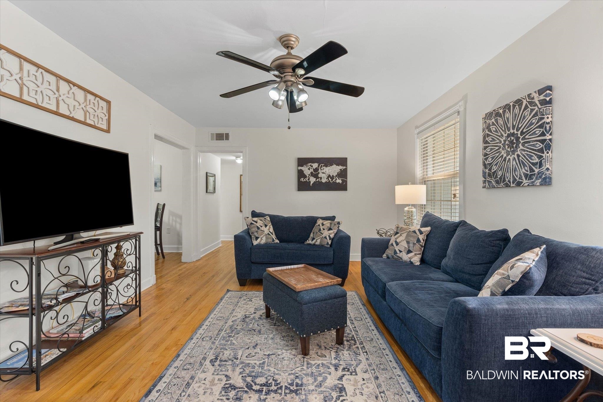 214 Upham Street, Unit 18A Mobile, AL 36607 - Photo 7 of 29 Living area with light wood-type flooring and ceiling fan