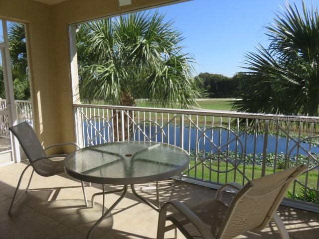 9720 Sea Turtle Terrace, Unit 201 Bradenton, FL 34212 - Photo 13 of 29 a view of a chairs on the roof deck