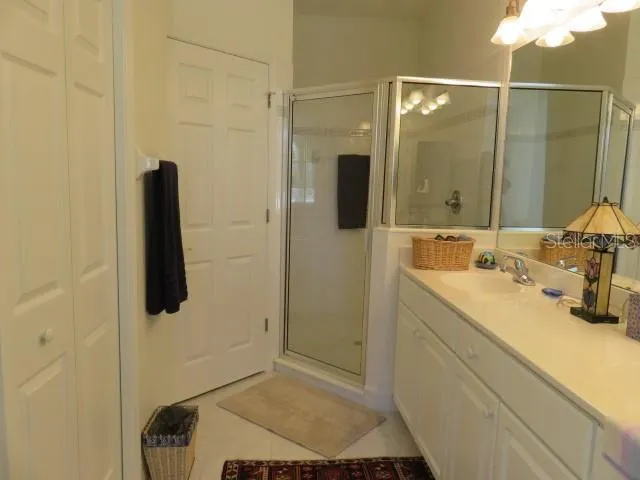 a bathroom with a sink and mirror