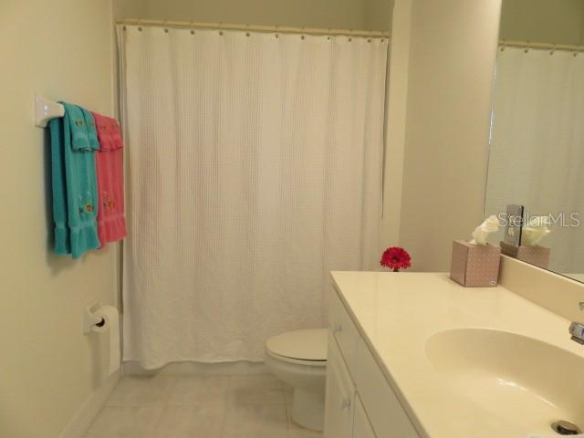 9720 Sea Turtle Terrace, Unit 201 Bradenton, FL 34212 - Photo 10 of 29 a bathroom with a sink and a toilet