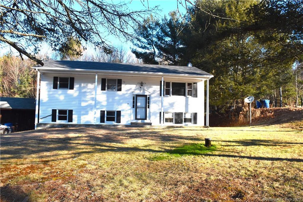 38 Henry Road Killingly, CT 06239 - Photo 1 of 1 a front view of a house with a yard