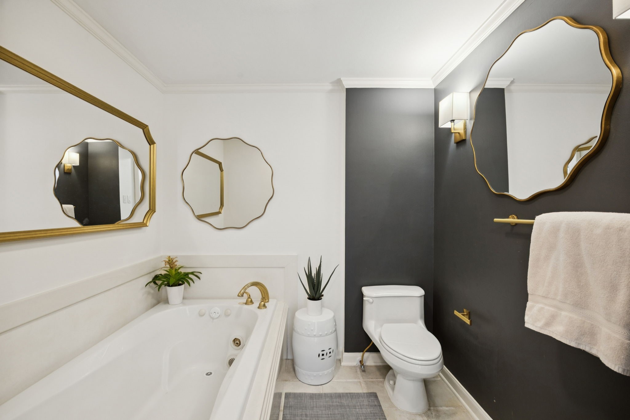 4964 Post Oak Timber Drive Houston, TX 77056 - Photo 35 of 48 a bathroom with a toilet a sink and mirror