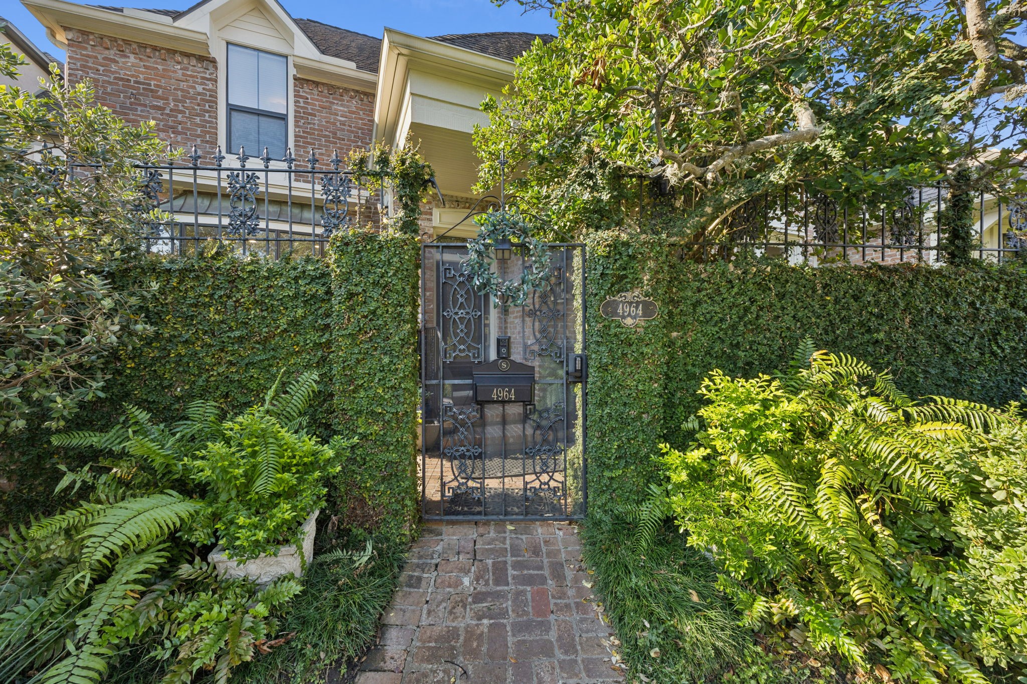 4964 Post Oak Timber Drive Houston, TX 77056 - Photo 5 of 48 a view of a pathway both side of the house