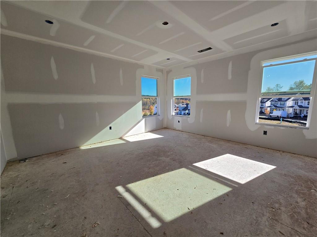 154 Marble Tree Way Ball Ground, GA 30107 - Photo 6 of 9 a view of a room with window