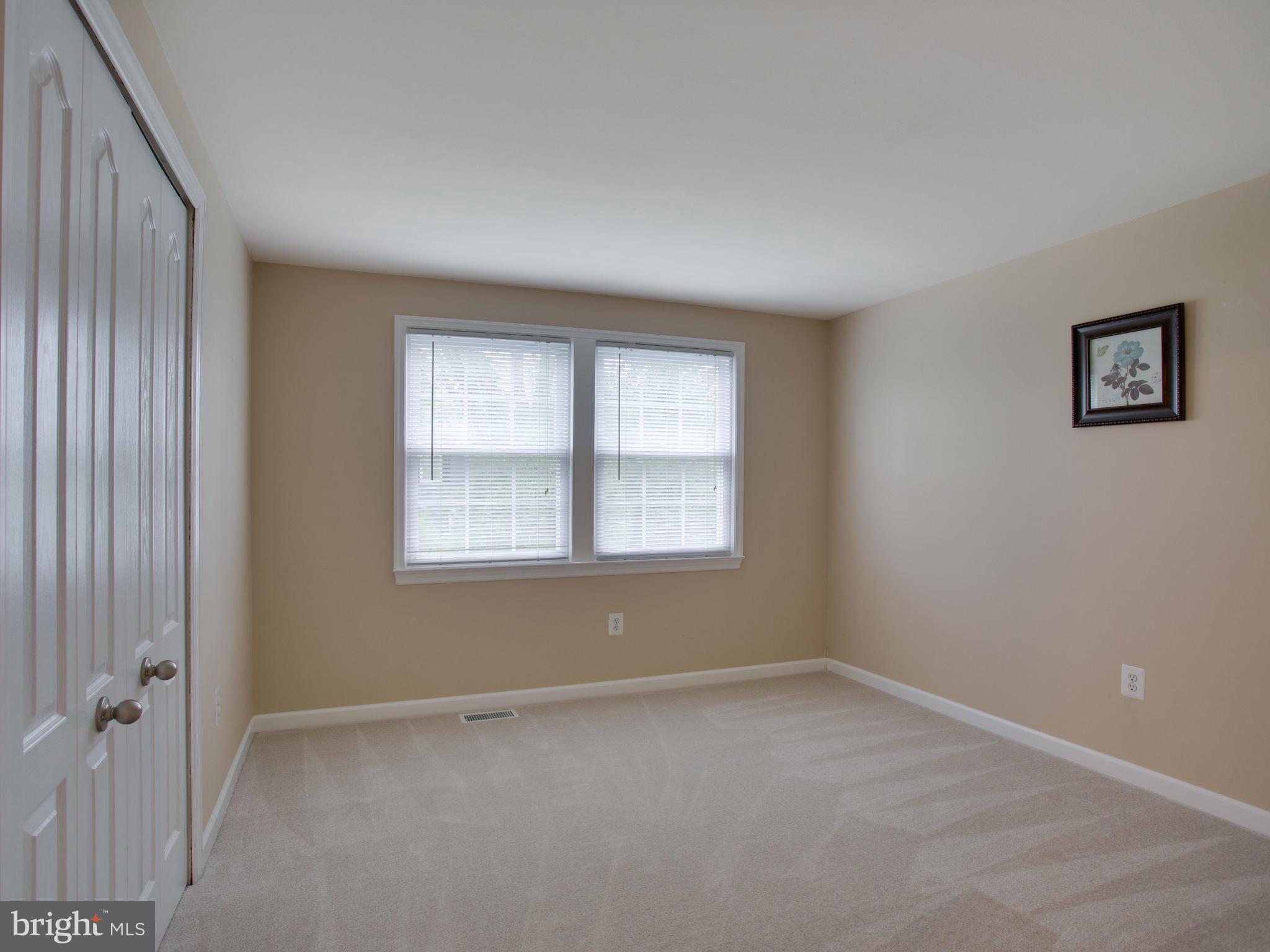 13132 Moss Ranch Lane Fairfax, VA 22033 - Photo 23 of 30 an empty room with a window
