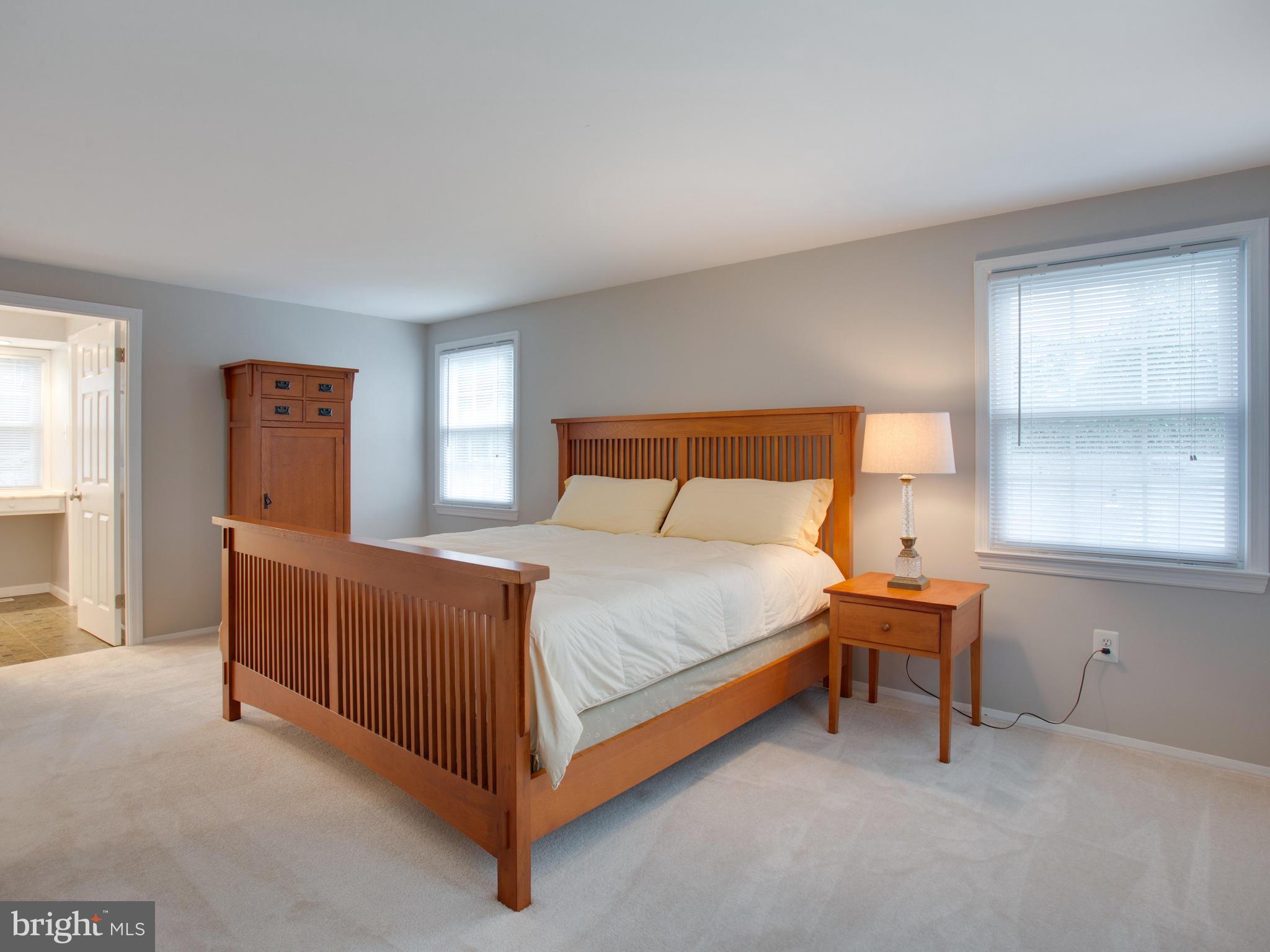 13132 Moss Ranch Lane Fairfax, VA 22033 - Photo 25 of 30 a bedroom with a bed and window