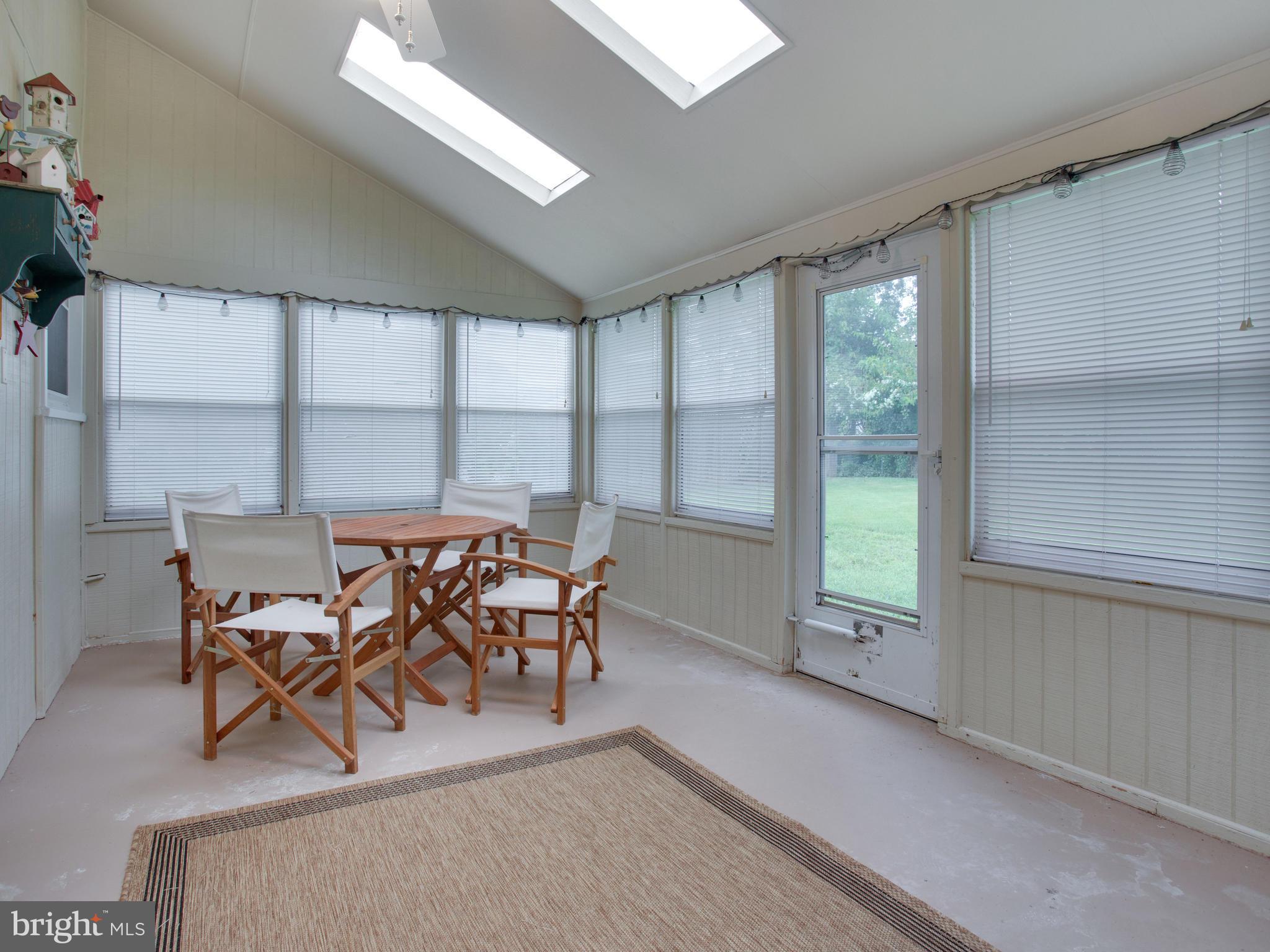 13132 Moss Ranch Lane Fairfax, VA 22033 - Photo 30 of 30 a dining room with furniture and window