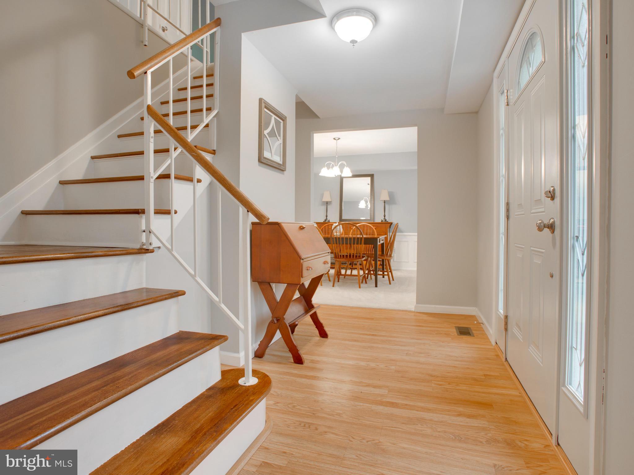 13132 Moss Ranch Lane Fairfax, VA 22033 - Photo 6 of 30 a view of entryway and hall with wooden floor