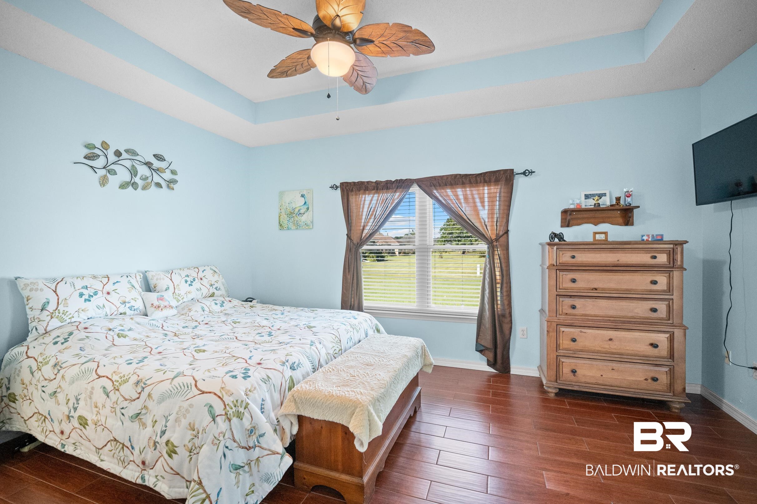 22355 East County Road 12 Foley, AL 36535 - Photo 27 of 54 Bedroom featuring a raised ceiling, dark wood-type flooring, and ceiling fan