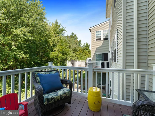 a view of a two chairs in the deck